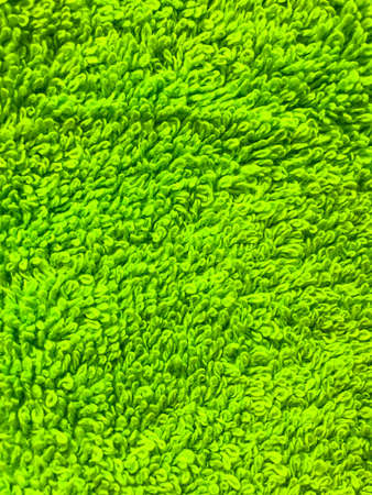 Abstract background of green terry cloth close-up. Studio Photoの写真素材