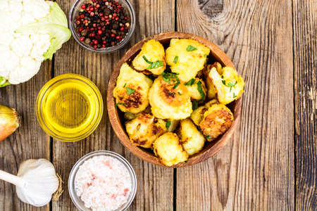 Vegetable dishes. Cauliflower, fried in breadcrumbs. Studio Photoの写真素材