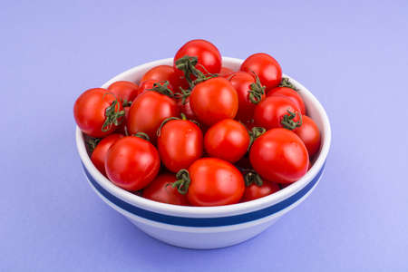 Tomatoes are small fresh ripe red. Studio Photoの写真素材