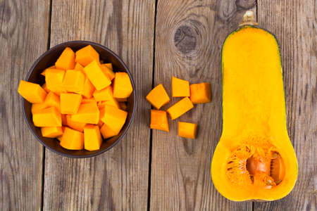Sliced pumpkin on wooden table. Studio Photoの写真素材