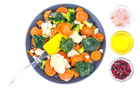 Frying pan with frozen vegetablesの写真素材