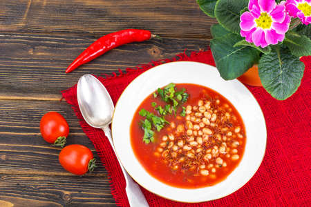 Hot spicy tomato soup with white beans and chiliの写真素材