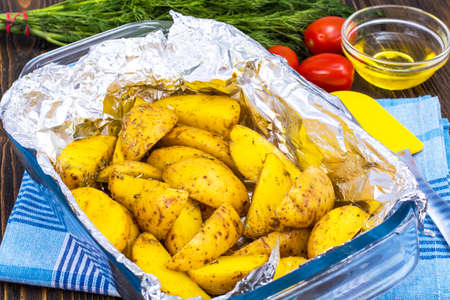 Potato slices for baking in the ovenの写真素材