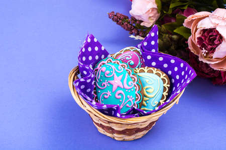 Easter eggs formed as tasty homemade cookies on bright backgroundの写真素材