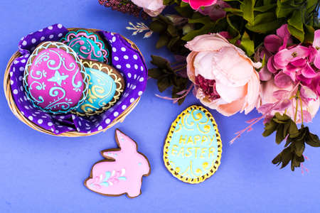 Easter eggs formed as tasty homemade cookies on bright backgroundの写真素材