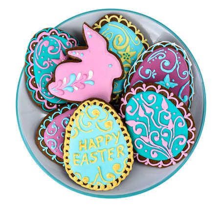 Easter homemade baked gingerbread cookies in the form of eggs with different pattern of icing on...