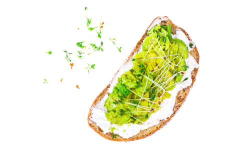 Healthy eating. Multi-grain bread with avocado and sprouts cress lettuceの写真素材