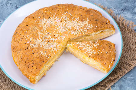 Homemade cake with cheese and sesame seedsの写真素材