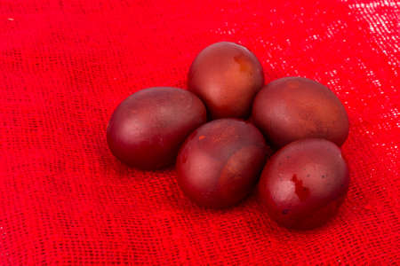 Red painted eggs as symbol of the holiday of Easterの写真素材