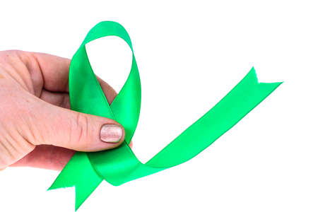 Green ribbon as symbol of awareness of the disease, World Health Dayの写真素材