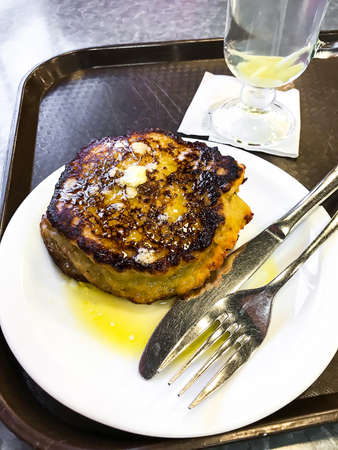 Potato pancakes stuffed with meat, on white plate