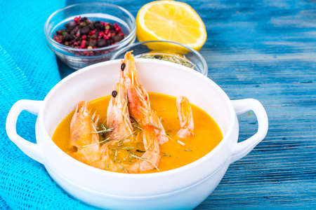 Cream soup with shrimps and spices. Studio photoの写真素材