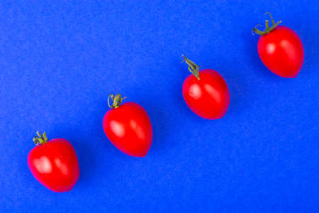Creative layout of tomatoes on bright background. Studio Photo
の写真素材