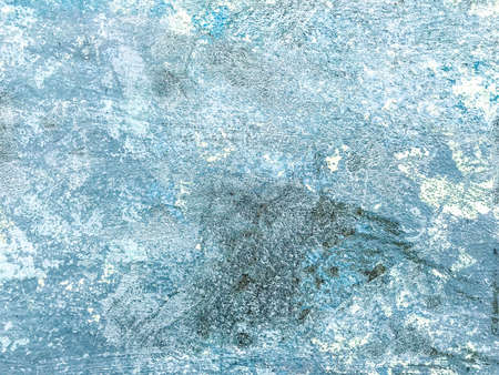 Plaster on the walls peeling, rags. Studio Photo