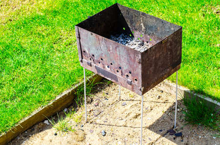 Metal box with ashの写真素材