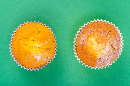 Tasty fresh cupcakes on bright backgroundの写真素材