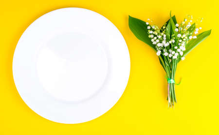 Bunch of tender white spring lilies of valley