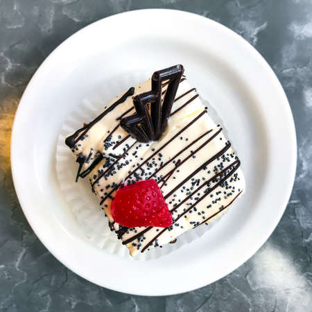 Sweet cake, dessert with cream and poppy seeds