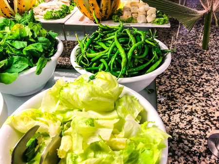 Dishes of fresh vegetables and herbs, greens. Studio Photoの写真素材