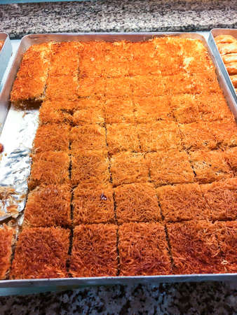 Traditional turkish baklava sweetness with honey. Studio Photo