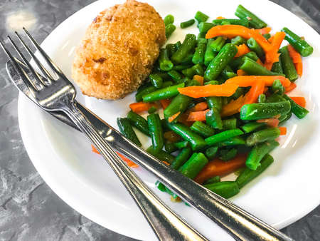 Garnish of green beans, carrotsの写真素材