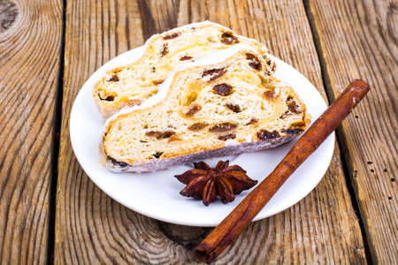 Christmas shtollen with raisins in sugar glazeの写真素材