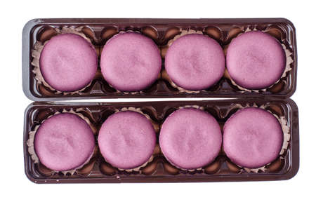 Delicate crumbly delightful purple macaroons. Studio Photo