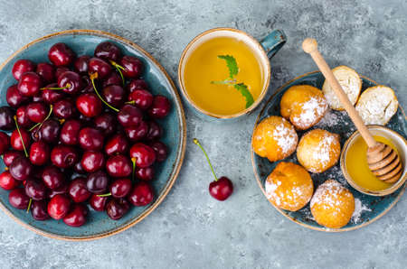 Dessert set on table, gray blue background. Studio Photoの写真素材