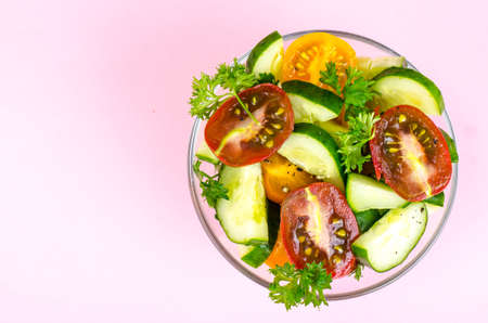 Bright creative background for fresh vegetable saladの写真素材