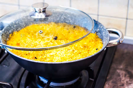 Preparation of pilaf with lamb in frying pan.の写真素材
