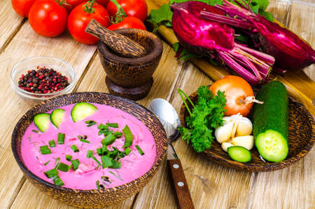 Vegetarian beet soup with green onions.の写真素材