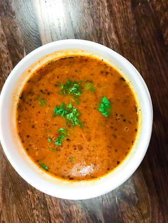 Soup kharcho on wooden table