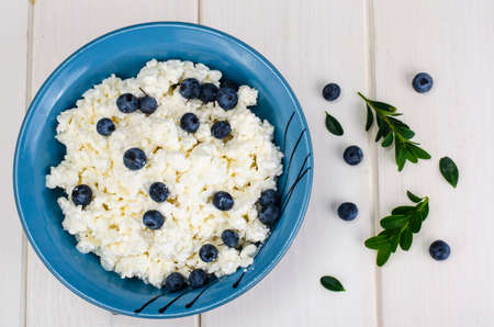 Fresh rustic cottage cheese with blueberryの写真素材