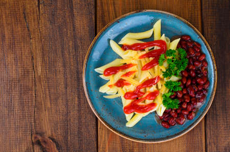 Pasta and beans in tomato sauce. Studio Photo