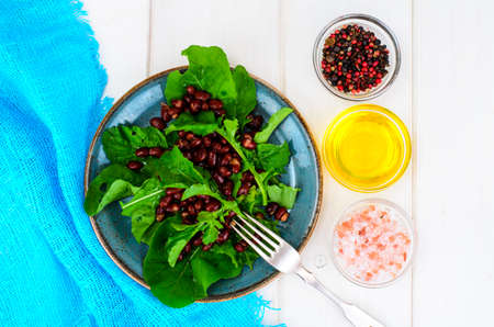 Vegetarian salad of red beans and arugula. Studio Photo