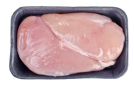 Raw chicken fillet in black plastic container. Studio photoの写真素材