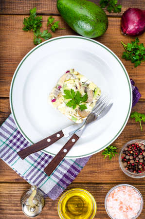 Dishes with avocado, salad with mushrooms and eggs, mayonnaise sauce. Studio Photoの写真素材