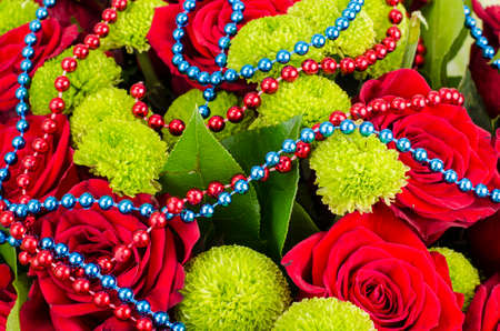 Bouquet of flowers and colored beads for Mardi gras. Studio Photoの写真素材