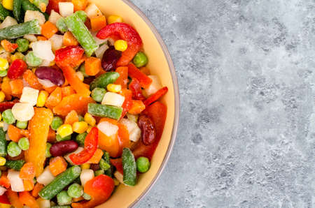 A bowl of mixed frozen vegetable with beansの写真素材