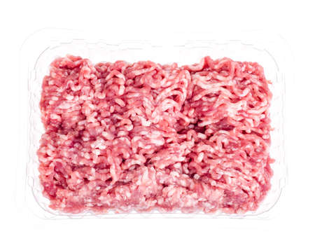 Raw minced meat in plastic containerの写真素材