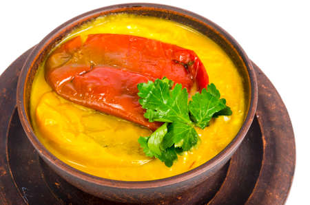Vegetable soup with sweet pepper puree, vegetarian dish. Studio Photo