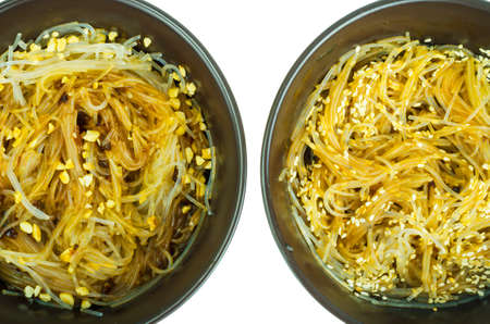 Hot glass noodles with sauce, peanuts, sesame. Studio Photoの写真素材