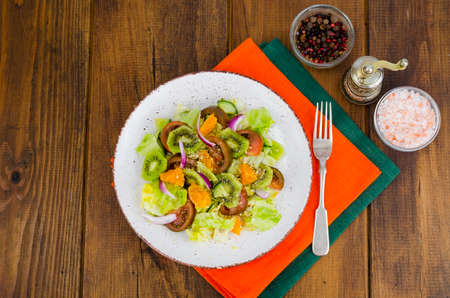 Fruit and vegetable salad with tangerines. Studio Photoの写真素材