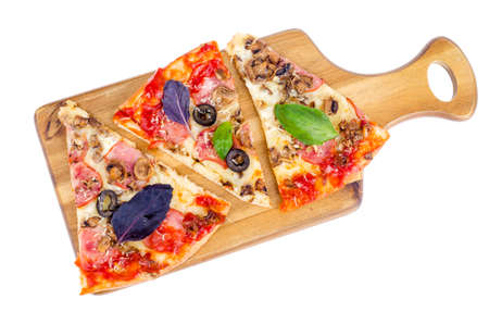 Kitchen wooden board with pizza slices isolated on white background. Studio Photo