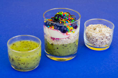 Healthy healthy food. Muesli, oatmeal, smoothies, berries, fruits, vegetables. Studio Photoの写真素材