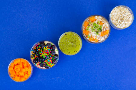 Healthy healthy food. Muesli, oatmeal, smoothies, berries, fruits, vegetables. Studio Photoの写真素材