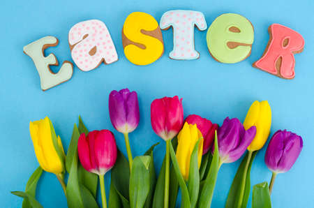 Beautiful fresh flowers and homemade Easter cookies. Studio Photo