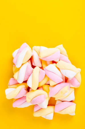 Colorful marshmallow on bright  background. Fluffy marshmallows texture and pattern.の写真素材