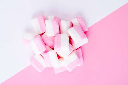 Colorful marshmallow on bright  background. Fluffy marshmallows texture and pattern. Studio Photo
