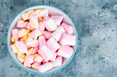 Colorful marshmallow on bright  background. Fluffy marshmallows texture and pattern.の写真素材